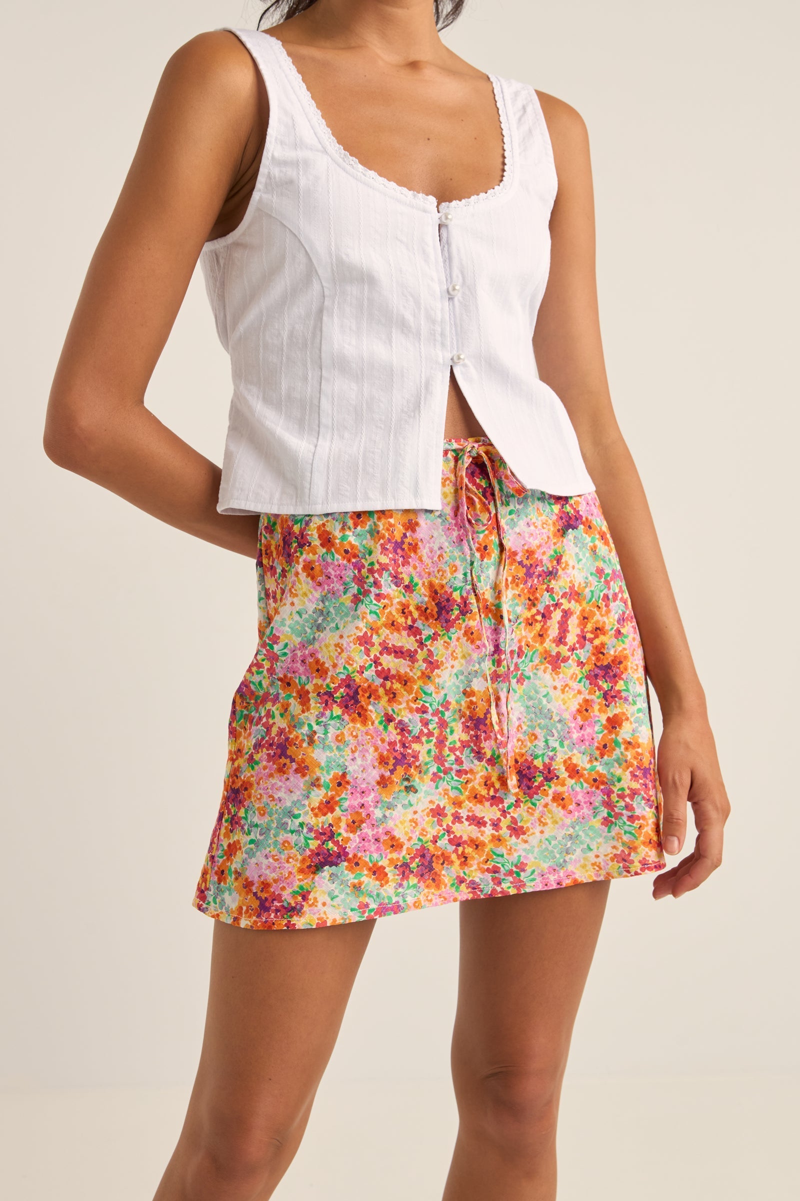 Orange floral mini skirt best sale